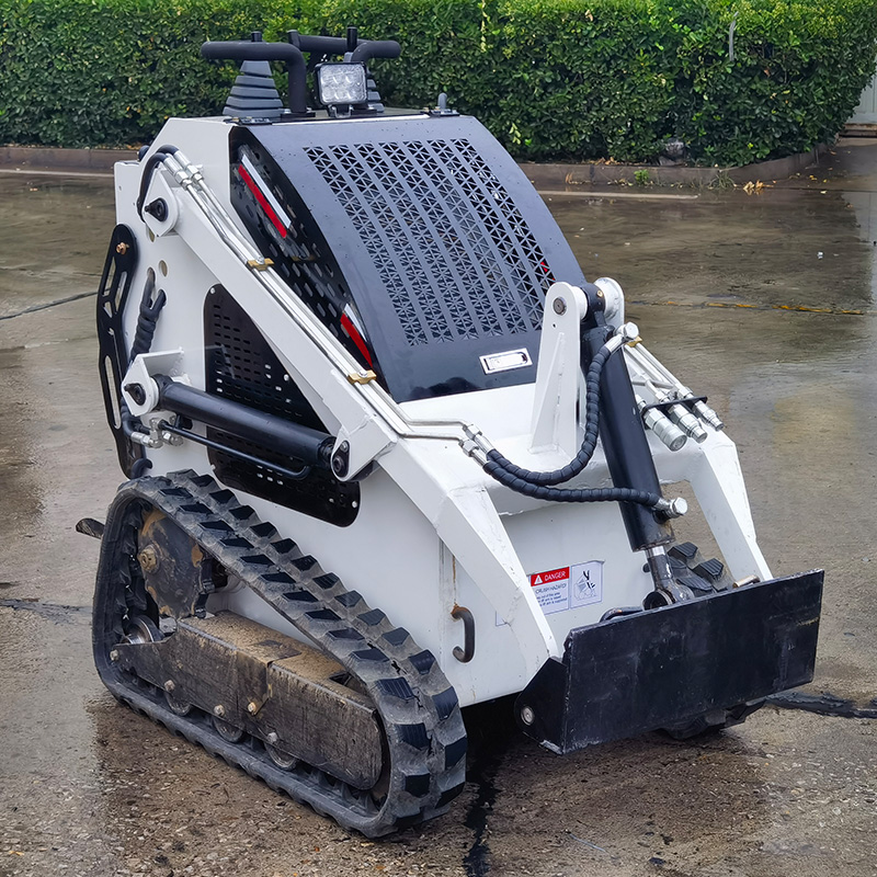 Manhole Cover Lifting - Skid Steer Loader for Utility Trenching